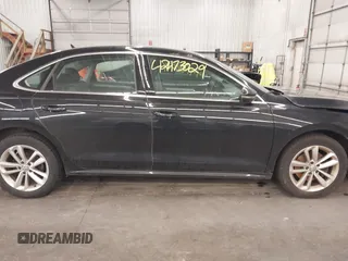2020 Volkswagen Passat SE with VIN 1VWWA7A3XLC021477, listed as a IAAI auction lot 42473029 with 96,434 mi miles and . Bid and sale history available at DreamBid. Image 14.