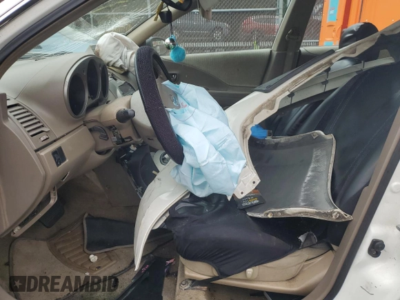 2003 Nissan Altima S z VIN 1N4AL11D23C170243, wystawiony jako Copart lot #60780585 z przebiegiem Nie podano mil oraz Szkoda całkowita • Salvage title. Historia ofert i sprzedaży dostępna na DreamBid. Obrazek 7.
