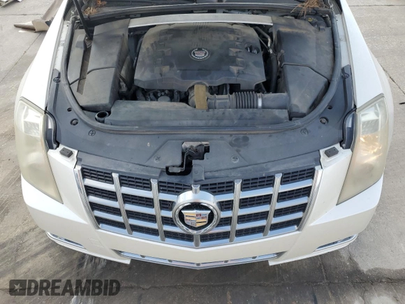 2014 Cadillac CTS Performance with VIN 1G6DG1E35E0190085, listed as a Copart auction lot 84347104 with 142,720 mi miles and Salvage title. Bid and sale history available at DreamBid. Image 12.