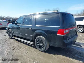 2015 Lincoln Navigator L with VIN 5LMJJ3JT3FEJ00335, listed as a IAAI auction lot 41585554 with 163,841 mi miles. Bid and sale history available at carsss.com. Image 3.