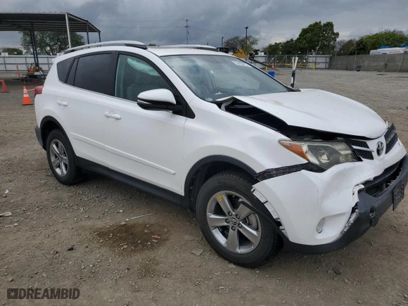 2015 Toyota RAV4 XLE with VIN 2T3WFREV6FW197553, listed as a Copart auction lot 53056415 with 157,169 mi miles and Salvage Title. Bid and sale history available at carsss.com. Image 4.