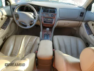 2002 Mitsubishi Diamante LS z VIN 6MMAP67P12T008394, wystawiony jako Copart lot #44022475 z przebiegiem 79 846 mil mil oraz Szkody całkowita. Historia ofert i sprzedaży dostępna na DreamBid. Obrazek 8.