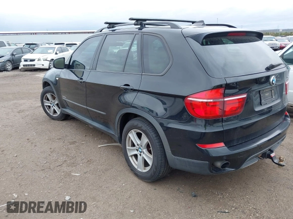 2012 BMW X5 35d z VIN 5UXZW0C55CL674191, wystawiony jako IAAI lot #41906713 z przebiegiem 143 687 mil mil oraz . Historia ofert i sprzedaży dostępna na DreamBid. Obrazek 3.