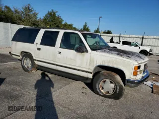 1999 GMC Suburban z VIN 3GKFK16RXXG503321, wystawiony jako Copart lot #77568614 z przebiegiem Nie podano mil oraz Tytuł czysty. Historia ofert i sprzedaży dostępna na DreamBid. Obrazek 4.