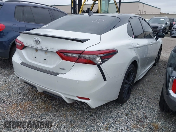 2022 Toyota Camry TRD with VIN 4T1KZ1AK4NU068897, listed as a IAAI auction lot 41851894 with 45,160 mi miles and . Bid and sale history available at DreamBid. Image 4.