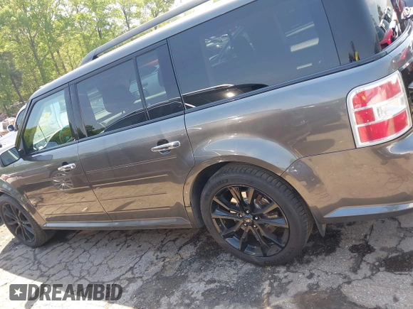 2016 Ford Flex SEL z VIN 2FMGK5C8XGBA08263, wystawiony jako IAAI lot #42066159 z przebiegiem 111 909 mil mil oraz . Historia ofert i sprzedaży dostępna na DreamBid. Obrazek 14.