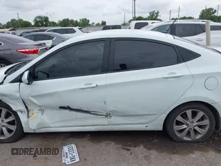 2013 Hyundai Accent GLS z VIN KMHCU4AE8DU275645, wystawiony jako IAAI lot #42139737 z przebiegiem 85 031 mil mil oraz . Historia ofert i sprzedaży dostępna na DreamBid. Obrazek 14.