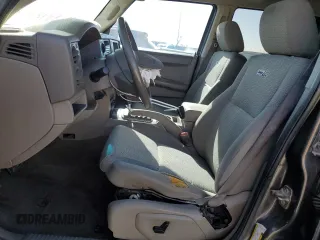 2006 Jeep Commander with VIN 1J8HH48K26C263986, listed as a Copart auction lot 84712294 with 216,923 mi miles and Salvage title. Bid and sale history available at DreamBid. Image 7.