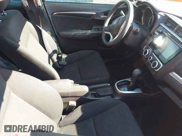 2015 Honda Fit EX-L z VIN 3HGGK5H81FM705199, wystawiony jako IAAI lot #42310099 z przebiegiem Nie podano mil oraz . Historia ofert i sprzedaży dostępna na DreamBid. Obrazek 5.