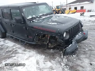 2021 Jeep Gladiator Rubicon z VIN 1C6JJTBG5ML605799, wystawiony jako IAAI lot #41190679 z przebiegiem 47 550 mil mil oraz . Historia ofert i sprzedaży dostępna na DreamBid. Obrazek 17.