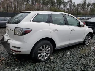 2011 Mazda CX-7 i SV z VIN JM3ER2A51B0380347, wystawiony jako Copart lot #50992345 z przebiegiem 141 713 mil mil oraz Nie do naprawy • Non repairable. Historia ofert i sprzedaży dostępna na DreamBid. Obrazek 3.