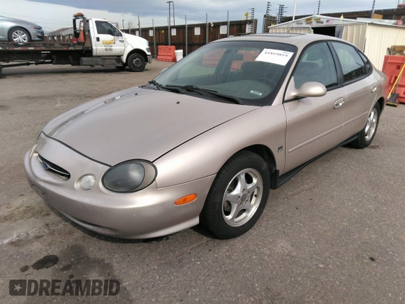 1999 Ford Taurus SE with VIN 1FAFP53S9XA330603, listed as a IAAI auction lot 41819819 with 207,025 mi miles. Bid and sale history available at carsss.com. Image 2.