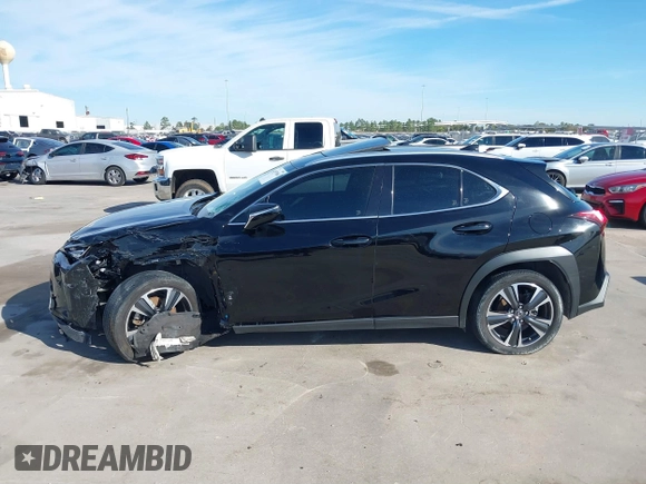 2021 Lexus UX with VIN JTHP3JBH2M2045075, listed as a IAAI auction lot 40979086 with 44,578 mi miles. Bid and sale history available at carsss.com. Image 14.