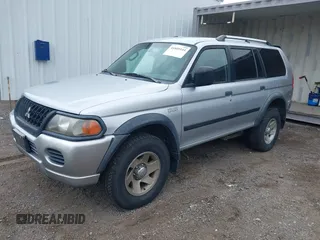 2004 Mitsubishi Montero Sport LS with VIN JA4MT21R24J003641, listed as a IAAI auction lot 41809144 with 223,449 mi miles. Bid and sale history available at carsss.com. Image 2.
