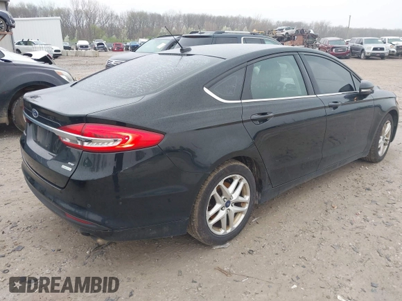 2018 Ford Fusion SE with VIN 3FA6P0HD7JR275157, listed as a IAAI auction lot 41961008 with 120,111 mi miles. Bid and sale history available at carsss.com. Image 4.