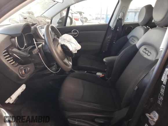 2016 FIAT 500X Pop with VIN ZFBCFXAT6GP356079, listed as a Copart auction lot 77602114 with 92,334 mi miles and Salvage title. Bid and sale history available at DreamBid. Image 7.