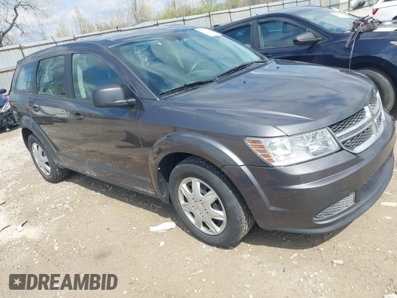 2014 Dodge Journey SE with VIN 3C4PDCAB1ET219760, listed as a IAAI auction lot 42013441 with 106,212 mi miles and . Bid and sale history available at carsss.com. Image 1.