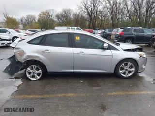 2014 Ford Focus SE with VIN 1FADP3F20EL406508, listed as a IAAI auction lot 40809098 with 89,731 mi miles. Bid and sale history available at carsss.com. Image 13.