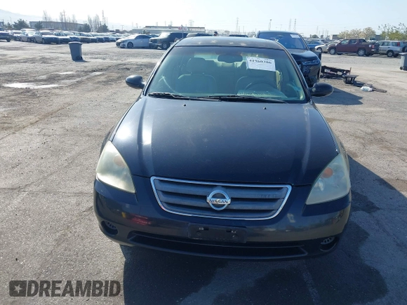 2003 Nissan Altima S with VIN 1N4AL11D93C268136, listed as a IAAI auction lot 41960386 with 181,444 mi miles. Bid and sale history available at carsss.com. Image 12.
