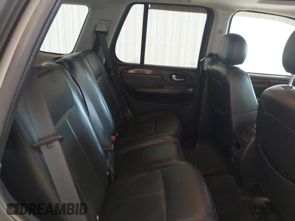2005 GMC Envoy SLE z VIN 1GKDT13S252285747, wystawiony jako IAAI lot #42340642 z przebiegiem Nie podano mil oraz . Historia ofert i sprzedaży dostępna na DreamBid. Obrazek 8.