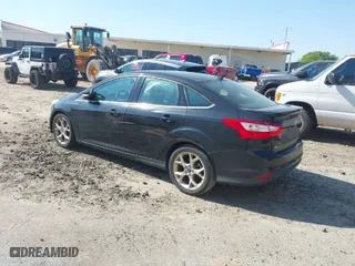 2014 Ford Focus Titanium with VIN 1FADP3J27EL227311, listed as a IAAI auction lot 41904675 with 180,459 mi miles. Bid and sale history available at carsss.com. Image 3.