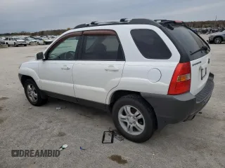 2005 Kia Sportage LX with VIN KNDJF723057125954, listed as a Copart auction lot 79454554 with 179,811 mi miles and Salvage Title. Bid and sale history available at carsss.com. Image 2.