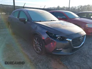 2018 Mazda 3 Touring with VIN 3MZBN1L32JM235162, listed as a IAAI auction lot 41596278 with 144,784 mi miles. Bid and sale history available at carsss.com. Image 1.
