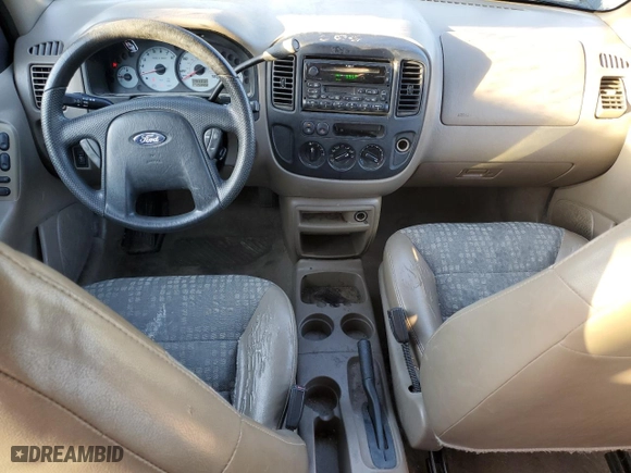 2001 Ford Escape XLS with VIN 1FMYU01161KA46822, listed as a Copart auction lot 48810055 with 253,402 mi miles and Salvage Title. Bid and sale history available at carsss.com. Image 8.