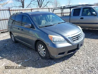 2010 Honda Odyssey EX z VIN 5FNRL3H44AB076668, wystawiony jako IAAI lot #41870491 z przebiegiem 194 387 mil mil oraz . Historia ofert i sprzedaży dostępna na DreamBid. Obrazek 1.