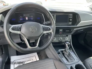 2024 Volkswagen Jetta S with VIN 3VW5M7BU5RM054856, listed as a IAAI auction lot 42744213 with 22,414 mi miles and . Bid and sale history available at DreamBid. Image 7.