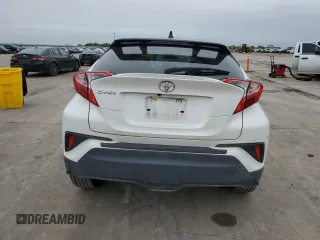 2020 Toyota C-HR LE with VIN JTNKHMBX3L1087972, listed as a Copart auction lot 51804715 with 57,738 mi miles and Salvage Title. Bid and sale history available at DreamBid. Image 6.
