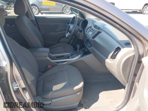 2012 Kia Sportage LX with VIN KNDPBCA28C7237079, listed as a IAAI auction lot 42663554 with 245,420 mi miles and . Bid and sale history available at DreamBid. Image 5.