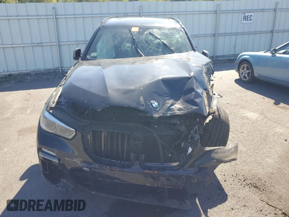 2020 BMW X5 M50i with VIN 5UXJU4C05LL228167, listed as a Copart auction lot 70390194 with Not Provided miles and Salvage Title. Bid and sale history available at DreamBid. Image 5.