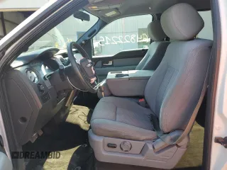 2014 Ford F-150 XL with VIN 1FTFW1EF3EFC97880, listed as a Copart auction lot 64822215 with 105,437 mi miles and Salvage title. Bid and sale history available at DreamBid. Image 7.