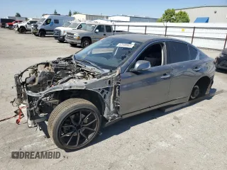 2014 Infiniti Q50 Premium with VIN JN1BV7AP8EM687620, listed as a Copart auction lot 62508865 with Not provided miles and Salvage title. Bid and sale history available at DreamBid. Image 1.
