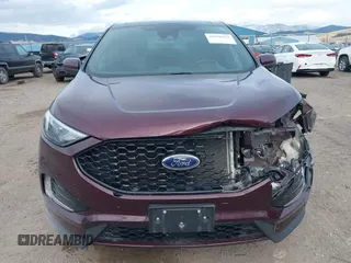 2021 Ford Edge SEL z VIN 2FMPK4J9XMBA59022, wystawiony jako IAAI lot #40596255 z przebiegiem 41 770 mil mil oraz . Historia ofert i sprzedaży dostępna na DreamBid. Obrazek 12.