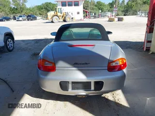 2002 Porsche Boxster z VIN WP0CA29882U622162, wystawiony jako IAAI lot #41654257 z przebiegiem 44 608 mil mil oraz . Historia ofert i sprzedaży dostępna na DreamBid. Obrazek 16.