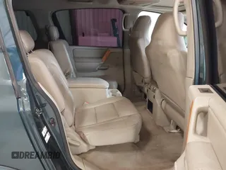 2005 Infiniti QX56 with VIN 5N3AA08C65N805076, listed as a IAAI auction lot 41353870 with 220,327 mi miles. Bid and sale history available at carsss.com. Image 8.