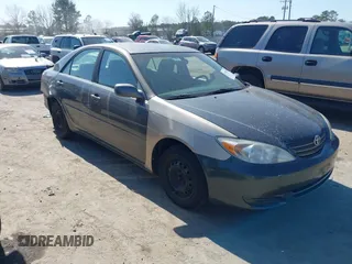 2003 Toyota Camry LE with VIN 4T1BE32K63U659008, listed as a IAAI auction lot 41790929 with 206,878 mi miles and . Bid and sale history available at DreamBid. Image 1.