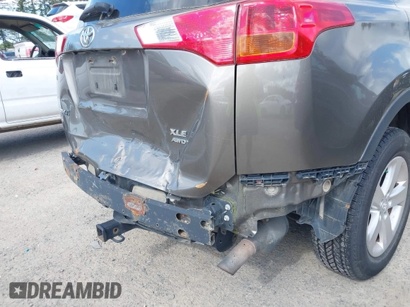 2013 Toyota RAV4 XLE with VIN JTMRFREV9DD024522, listed as a IAAI auction lot 42169755 with 164,493 mi miles and . Bid and sale history available at carsss.com. Image 6.