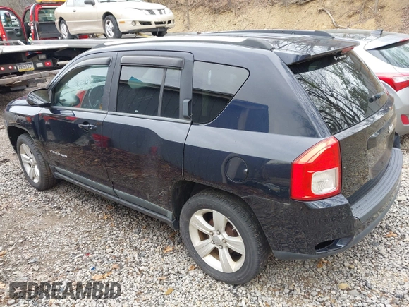 2011 Jeep Compass Latitude with VIN 1J4NT1FB8BD194438, listed as a IAAI auction lot 42130688 with 186,257 mi miles. Bid and sale history available at carsss.com. Image 3.