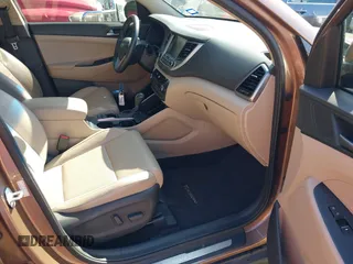 2016 Hyundai Tucson Limited with VIN KM8J33A25GU074798, listed as a IAAI auction lot 42103566 with 143,777 mi miles and . Bid and sale history available at carsss.com. Image 5.