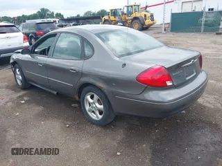 2003 Ford Taurus SE Standard with VIN 1FAFP53U43A233028, listed as a IAAI auction lot 42624211 with 65,364 mi miles and . Bid and sale history available at DreamBid. Image 3.