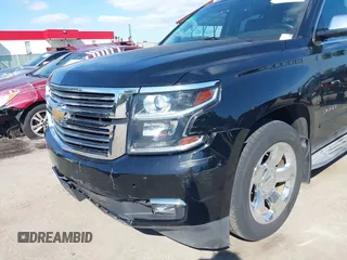 2015 Chevrolet Tahoe LTZ z VIN 1GNSKCKC3FR104845, wystawiony jako IAAI lot #42291785 z przebiegiem 75 047 mil mil oraz . Historia ofert i sprzedaży dostępna na DreamBid. Obrazek 19.