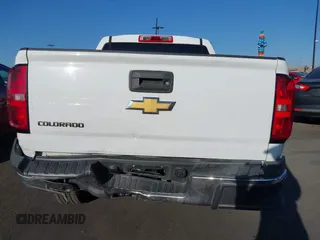 2019 Chevrolet Colorado 2WD Work Truck with VIN 1GCGSBEA1K1115077, listed as a IAAI auction lot 41653601 with 92,537 mi miles and . Bid and sale history available at DreamBid. Image 16.