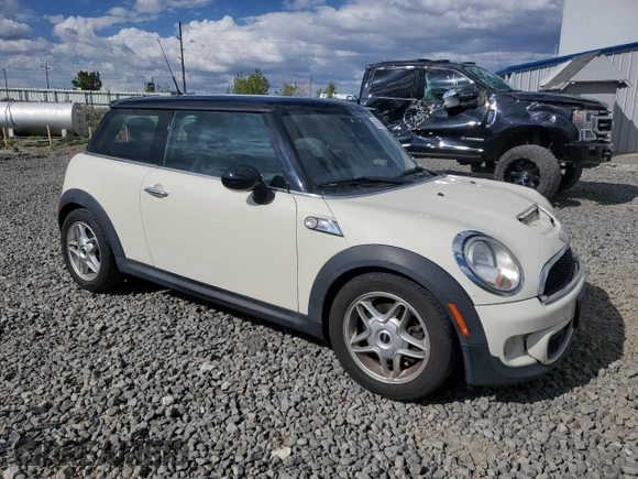 2011 MINI Hardtop S with VIN WMWSV3C57BTY14678, listed as a Copart auction lot 55501545 with 119,995 mi miles and Salvage title. Bid and sale history available at DreamBid. Image 4.