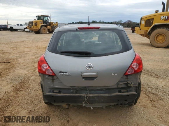 2009 Nissan Versa 1.8 SL with VIN 3N1BC13E99L405497, listed as a Copart auction lot 83811544 with 110,332 mi miles and Salvage Title. Bid and sale history available at carsss.com. Image 6.