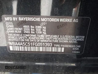 2015 BMW 4 Series 428i with VIN WBA4A5C51FG051393, listed as a IAAI auction lot 42041960 with 136,929 mi miles and . Bid and sale history available at carsss.com. Image 9.