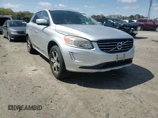 2014 Volvo XC60 R-Design Premier Plus z VIN YV4902DZ1E2543491, wystawiony jako Copart lot #51699955 z przebiegiem 114 688 mil mil oraz Szkoda całkowita • Salvage title. Historia ofert i sprzedaży dostępna na DreamBid. Obrazek 11.