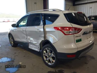 2016 Ford Escape Titanium with VIN 1FMCU9J94GUC28648, listed as a IAAI auction lot 42043761 with 82,509 mi miles and . Bid and sale history available at DreamBid. Image 3.